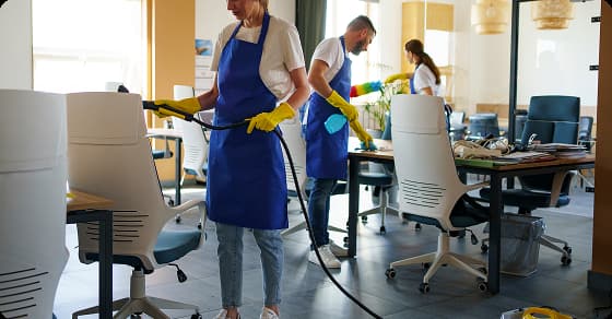 Professional cleaners providing an office cleaning service